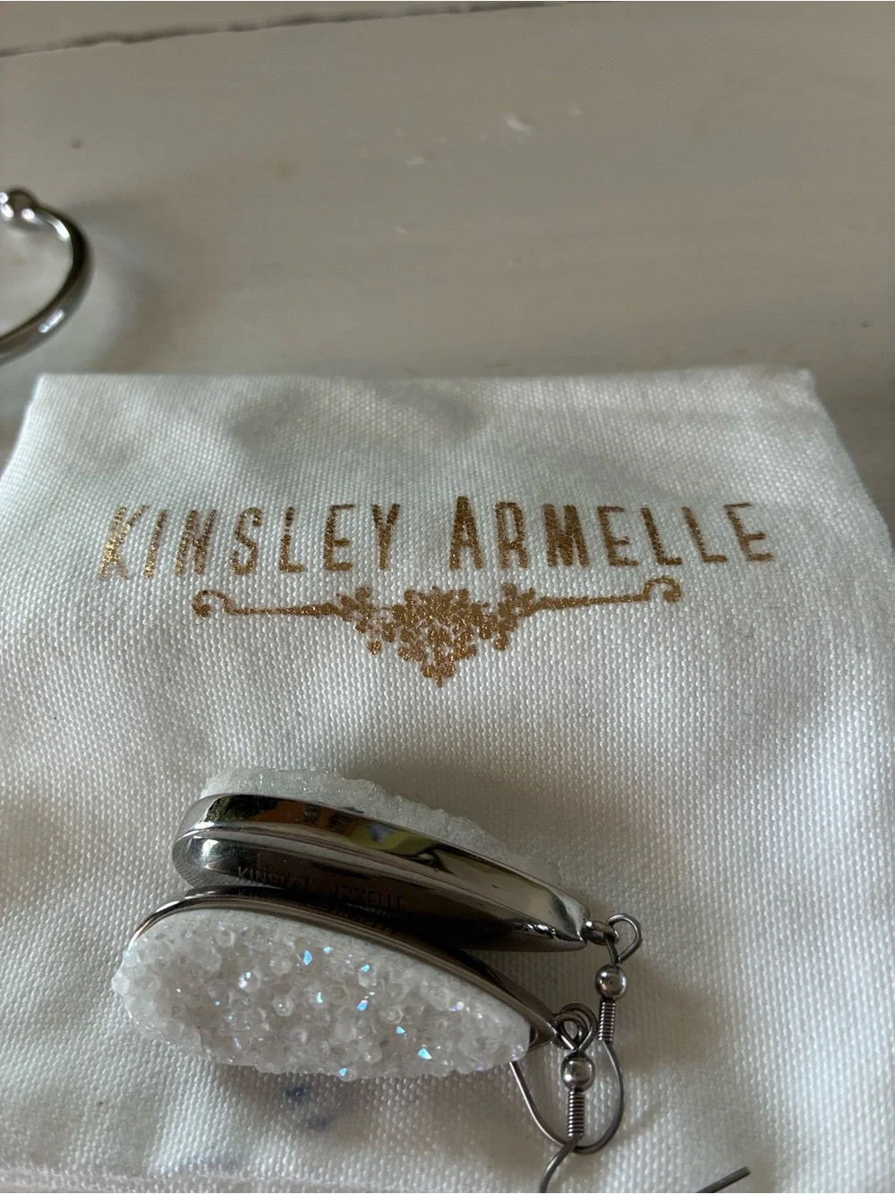 Kinsley Armelle White Druzy Teardrop Earrings and matching silver tone bracelet
